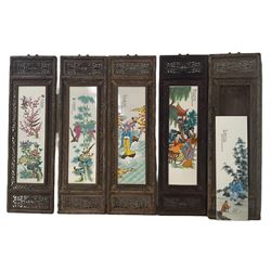 Manner of Liu Yucen (Chinese 1904-1969): Birds Flowers Mythological Scenes and Figures, set five painted porcelain plaques inscribed, housed in carved wooden frames with fretwork design 74cm x 21cm (5)