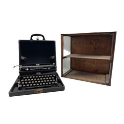 Royal Junior typewriter in original case, together with a glazed display case (2)