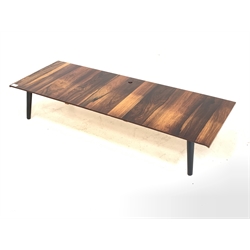 Hardwood low coffee table, raised on ebonised tapered splayed supports 