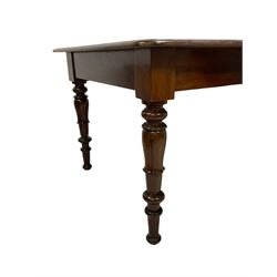 Victorian mahogany extending dining table, rectangular ovolo-moulded top with rounded corners, pull-out action with two additional leaves, on turned and lappet carved supports 