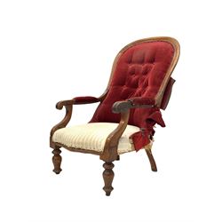 Victorian spoon back armchair, the mahogany cresting rail over upholstered back and seat, raised on turned supports W62cm