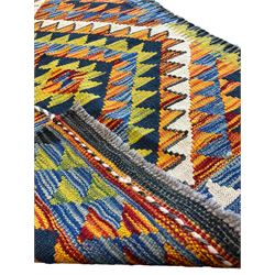 Chobi Kilim multi-colour runner rug, the field with three lozenges in shades of indigo and amber, each with rows of triangles of contrasting colours