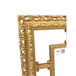 Ornate gilt framed wall mirror with beaded border and scrolled acanthus leaf  decoration to frame 53cm x 84cm