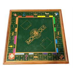 Monopoly 'The Player's Edition', wooden cased with fitted interior housing the playing pieces