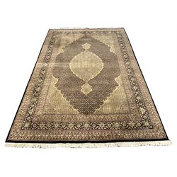 Persian Mahi design ground rug, pole medallion on black field with repeating design, enclosed by triple guarded border 298cm x 202cm