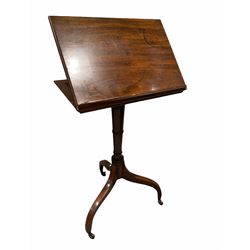 Early Victorian mahogany reading table, the angle adjustable moulded top over ring turned column and raised on three inverted splayed supports with castors 