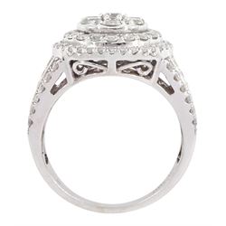 18ct white gold round brilliant cut diamond cluster ring, with diamond set shoulders, stamped 750, total diamond weight 1.50 carat