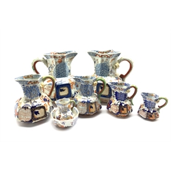 19th century Mason's Ironstone small octagonal Hydra jug and bowl with Serpent handle, together with a graduated set of four Victorian Davenport Stone China jugs, H16cm max and two matching 19th century Hydra jugs, H22cm (8) 