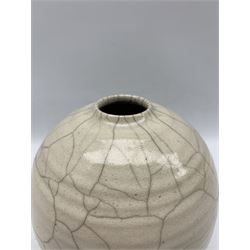 Rudie Delanghe (British 1955-): Studio pottery raku vase of ovoid form with partial crackle glaze, signed and dated '86 H19cm