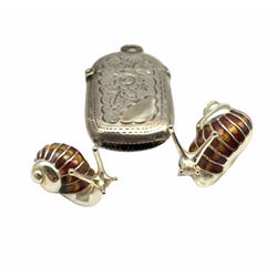 Pair of graduated silver and brown/amber enamel snails, larger L3cm London 2001 Maker Mappin and Webb, and an engraved silver vesta case
