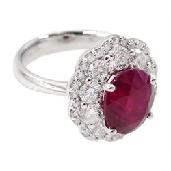 18ct white gold oval ruby and diamond cluster ring, stamped 750, ruby approx 3.00 carat, total diamond weight approx 1.50 carat