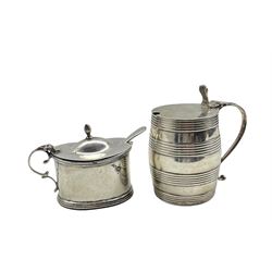 George III silver barrel shaped mustard pot with blue glass liner and loop handle `H8cm London 1813 Maker Samuel Meriton II and an oval mustard pot 