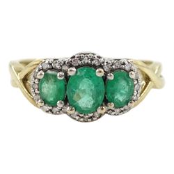 9ct gold three stone oval emerald and diamond cluster ring, hallmarked 