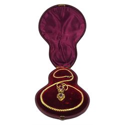 Victorian gold snake necklace, the stylised serpent head set with garnets, chrysoberyl's and gemstones, suspending a heart shaped pendant with glazed verso, on an articulated gold snake link chain, in fitted velvet and silk lined case