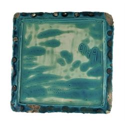 Burmantofts Faience turquoise-glaze stick stand, of square sectional form, moulded to the exterior with bamboo style decoration, the base with teardrop shaped aperture,  impressed factory marks beneath, model no. 949, H66cm x W28cm 

