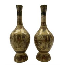 Pair of Japanese Satsuma vases, each of bottle form and gilded throughout with butterflies, birds, flowers and foliage, H30.5cm 