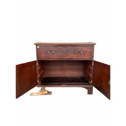 Georgian mahogany secretaire, the pierced brass galleried top over pull out fall front drawer revealing fitted interior, two panelled cupboards to base with brass inlay, raised on bracket supports W119cm