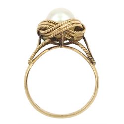 14ct gold single stone pearl knot design ring, stamped