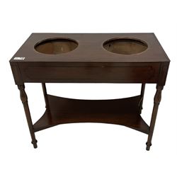19th century mahogany double washstand, rectangular top with moulded edge and fitted with twin inset bowl rests, the frieze with ebony stringing, raised on turned supports united by concave rectangular undertier