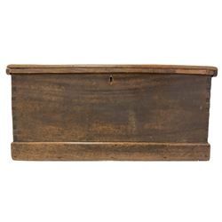 Victorian camphor wood sea chest of tapering form, the hinged lid revealing interior fitted with candle box,  rope carry handle to each end, skirted base W95cm