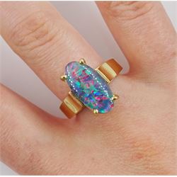 Gold oval opal triplet ring, stamped 9ct 
