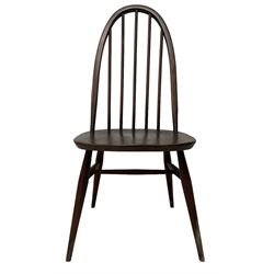 Ercol - set of eight dark elm and beech 'Quaker Windsor' dining chairs, high hoop and stick back over splayed supports united by H-stretcher; with matching Ercol easy armchair
