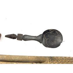 African spoon with incised bowl L33cm, Samoan model carved wood canoe inscribed 'Apia Samoa' L81cm and a carved Chinese figure