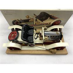 Mamod steam roadster with cream and chrome livery and red spoke wheels in original box