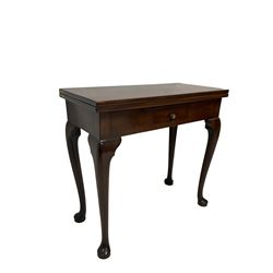 George III mahogany tea table, rectangular fold-over top supported by gate-leg action, fitted with single central drawer, raised on cabriole supports with pad feet