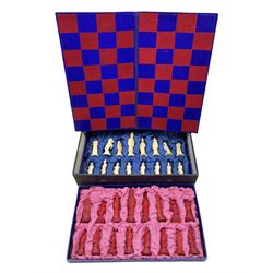Chinese bleached bone chess set, part stained red, with chess board in a fitted case, King H9cm