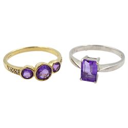 Yellow gold three stone amethyst ring, with diamond set shoulders and a white gold single stone amethyst ring, both hallmarked 9ct