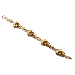 Gold flower and leaf link bracelet, stamped Regal 10K, approx 9.2gm