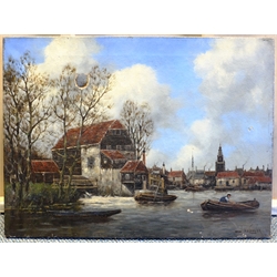 Hermanus Koekkoek the Younger (Dutch 1836-1909): Dutch Canal Scene, oil on canvas signed with pseudonym Jan van Couver 46cm x 61cm (unframed)
