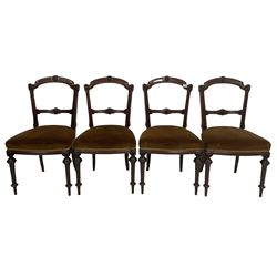 Set four Victorian walnut dining chairs, with upholstered seat, raised on turned and squared supports 