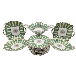 Victorian porcelain dessert service decorated with green and plain striped borders, comprising a two handled comport with pierced bowl, two oval serving dishes, two square serving dishes and twelve plates
