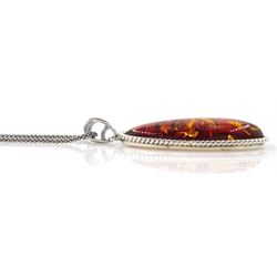 Silver Baltic amber oval pendant necklace, stamped 925 
