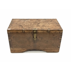  Northern Indian teak performers chest, the metal bound exterior decorated with inlaid brass detail and carry handle to each end, hinged lid revealing interior fitted with carved wooden cupboards, lift out trays, raised on recessed wooden wheels, W80cm, H44cm, D48cm  