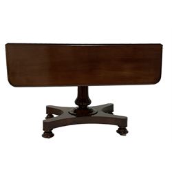 19th century mahogany rectangular drop-leaf table, shaped and moulded frieze rail, raised on reeded vasiform pedestal with floral collar, the quadriform base terminating in turned feet on castors