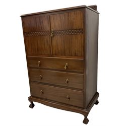 Early 20th century mahogany tallboy, double cupboard over three drawers, on ball and claw carved cabriole feet
