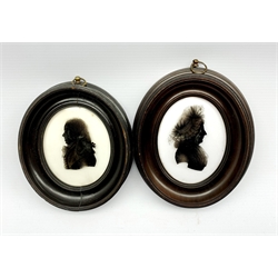 Isabella Beetham (1753-1825) Silhouette reverse painted on glass of a lady from the Deent family of Drummonds Bank, trade label to reverse 9cm x 7cm, and another of a gentleman reverse painted on glass with partial trade label to the reverse (2)