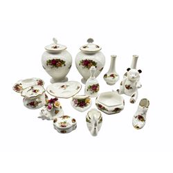 Royal Albert Old Country Roses decorative ceramics to include a pair of lidded vases, pair of posy vases, trinkets etc and a later model of a bear produced by Royal Doulton