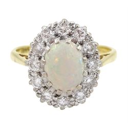 18ct gold oval opal and diamond cluster ring, hallmarked