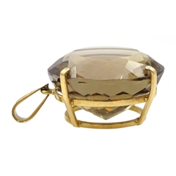 Gold circular smoky quartz ring and a smoky quartz gold pendant, both 17ct 