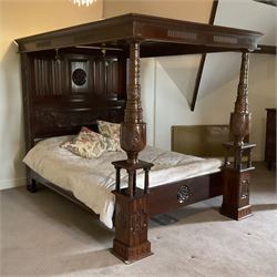 Mid to late 20th century mahogany 5’ Kingsize four poster bed, panelled canopy with dentil and fluted frieze, two turned baluster front supports carved with grape vine and leaves, linen fold panelled back with central rose carving, monogrammed sides ‘A’ and ‘R’, together with mattress 