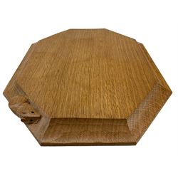 Mouseman - adzed oak breadboard, extended octagonal form with moulded edge carved with mouse signature, by the workshop of Robert Thompson, Kilburn 
