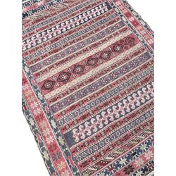 Flat weave rug, triple band border enclosing horizontal bands decorated with stylised and geometric motifs