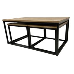 Nest of three contemporary tables, on black finish metal bases