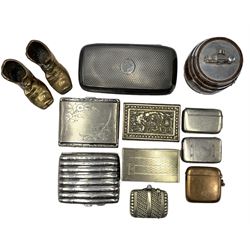 Collection of smoking paraphernalia to include a Victorian silver-plated pocket cigar case, Victorian silver-plated cigarette case of lobed form with engraved decoration, vesta cases, barrel form table lighter, pair of brass boot matchstick holders 