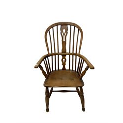 19th century Windsor armchair, the splat and spindle back over elm seat, raised on turned supports united by H stretcher base