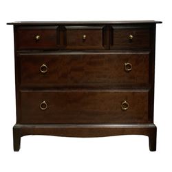 Stag Minstrel - mahogany chest of drawers, fitted with three short and two long drawers, raised on bracket supports 